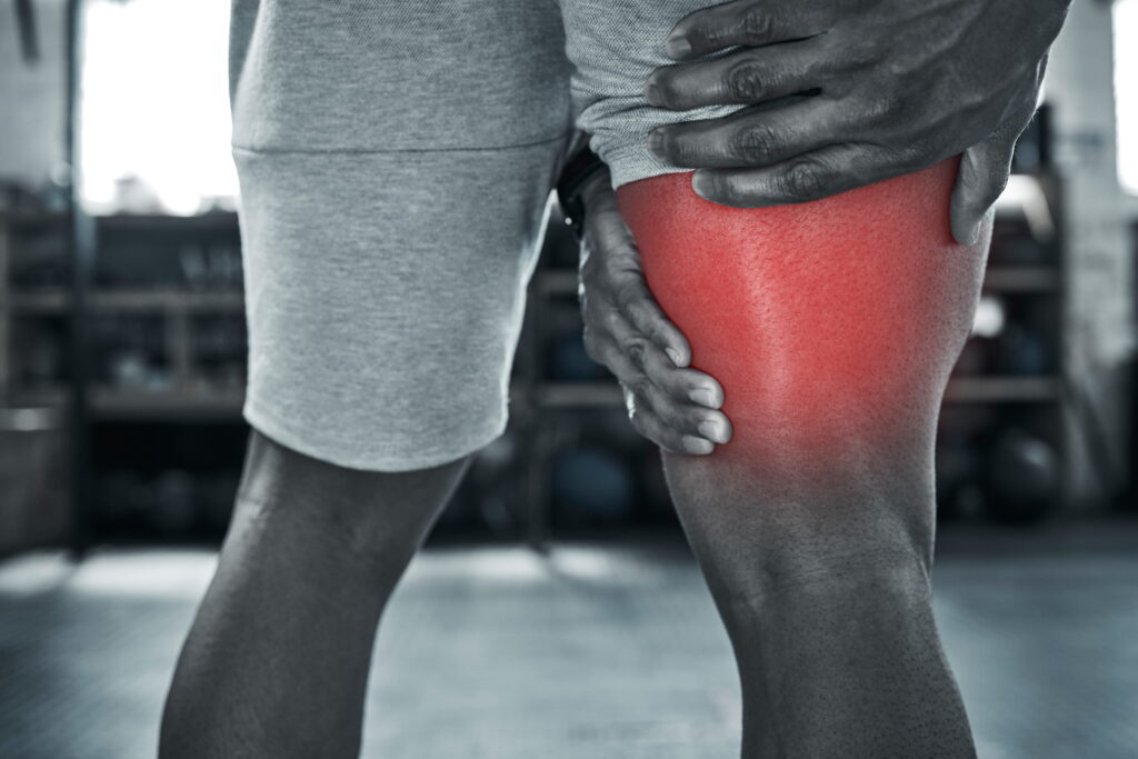 hands athlete thigh pain from fitness injury with overlay exercise accident hamstring risk tendinitis person legs red glow performance fail muscle problem sports emergency (1)